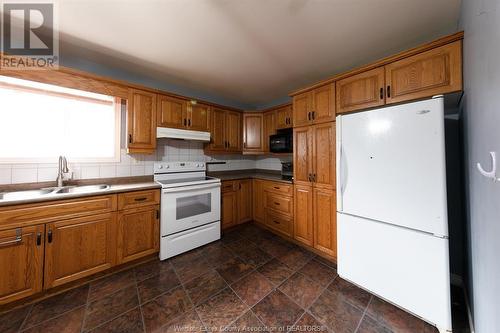 3740 Holburn, Windsor, ON - Indoor Photo Showing Kitchen With Double Sink