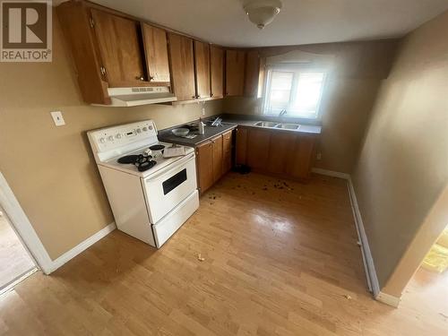 144 Main Street, Leading Tickles, NL - Indoor Photo Showing Kitchen With Double Sink