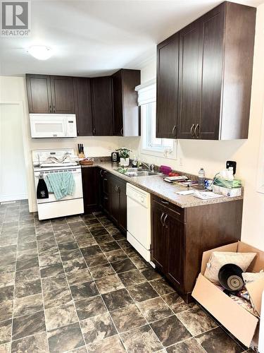 19 Albany St, Kapuskasing, ON - Indoor Photo Showing Kitchen With Double Sink