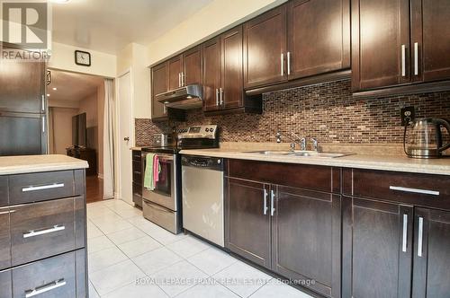 #35 -33 Dundalk Dr, Toronto, ON - Indoor Photo Showing Kitchen With Double Sink