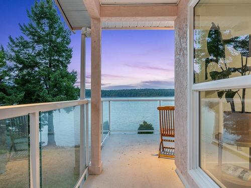 7770 Ships Point Rd, Fanny Bay, BC - Outdoor With Body Of Water With Exterior
