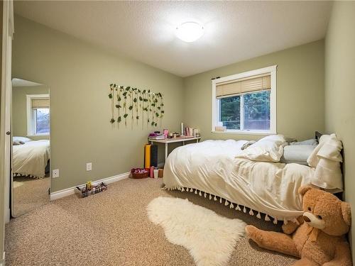 202-6149 Washington Way, Nanaimo, BC - Indoor Photo Showing Bedroom