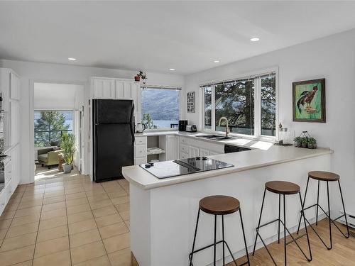 3943 Trepanier Heights Place, Peachland, BC - Indoor Photo Showing Kitchen With Double Sink