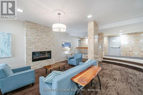 #1009 -44 Longbourne Dr, Toronto, ON - Indoor Photo Showing Living Room With Fireplace