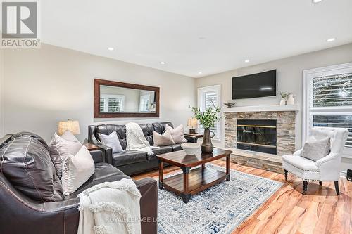 402 Mariners Way, Collingwood, ON - Indoor Photo Showing Living Room With Fireplace