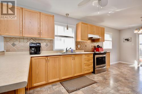 27 Stonemount Cres N, Essa, ON - Indoor Photo Showing Kitchen With Double Sink