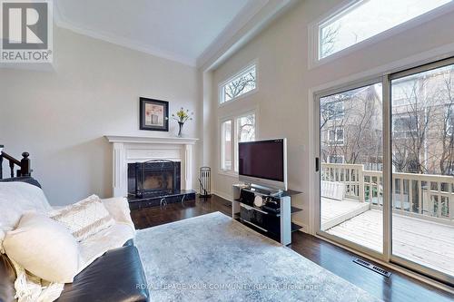 56 Carnival Crt, Toronto, ON - Indoor Photo Showing Living Room With Fireplace