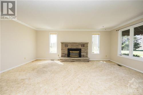 420 Hartsgravel Road, Delta, ON - Indoor Photo Showing Living Room With Fireplace