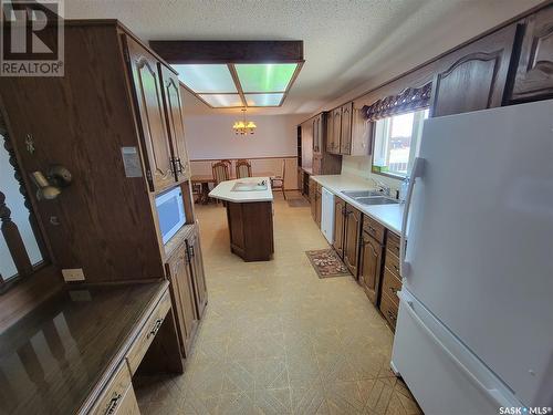 5204 Post Place, Macklin, SK - Indoor Photo Showing Kitchen With Double Sink