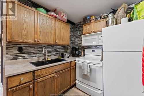 1151 Drouillard, Windsor, ON - Indoor Photo Showing Kitchen With Double Sink