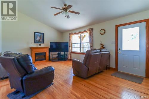 32 Mcgraw Road, Bains Corner, NB - Indoor Photo Showing Living Room With Fireplace