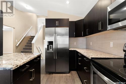8704 Kestral Drive, Regina, SK - Indoor Photo Showing Kitchen With Upgraded Kitchen
