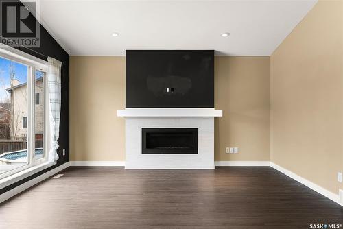 8704 Kestral Drive, Regina, SK - Indoor Photo Showing Living Room With Fireplace