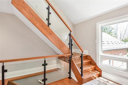 Modern glass staircase - 25 Hammond Road, Brant, ON - Indoor Photo Showing Other Room