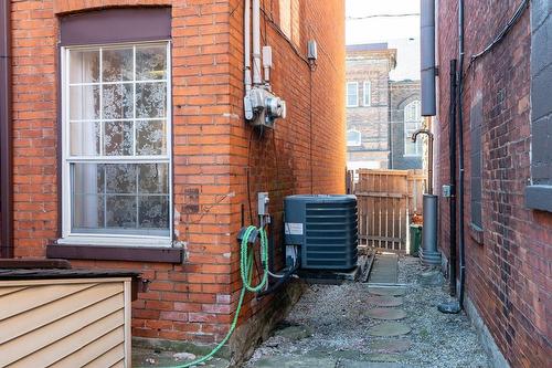 2 Hydro Meters & AC unit - 527 Barton Street E, Hamilton, ON - Outdoor With Exterior
