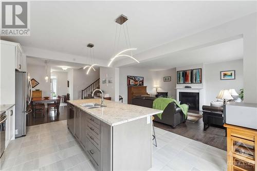 60 Pelham Crescent, Ottawa, ON - Indoor Photo Showing Kitchen With Fireplace With Double Sink With Upgraded Kitchen