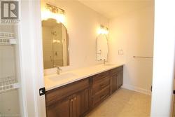 Ensuite photo from previous unit by seller - 