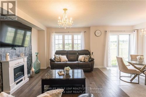 3 Cooke Ave, Brantford, ON - Indoor Photo Showing Living Room With Fireplace