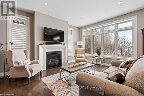 #1 -5622 Ironwood St, Niagara Falls, ON - Indoor Photo Showing Living Room With Fireplace