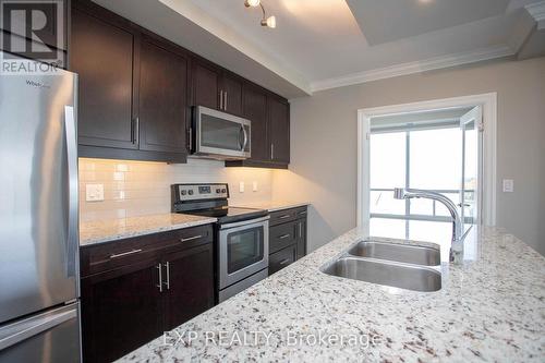 604 - 260 Villagewalk Boulevard, London, ON - Indoor Photo Showing Kitchen With Stainless Steel Kitchen With Double Sink With Upgraded Kitchen