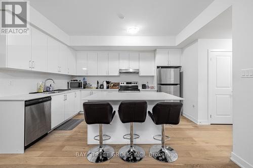#6 -39 John Perkins Bull Dr W, Toronto, ON - Indoor Photo Showing Kitchen With Stainless Steel Kitchen With Upgraded Kitchen