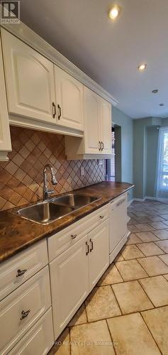 12 Simmons Blvd, Brampton, ON - Indoor Photo Showing Kitchen With Double Sink