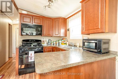 #A22 -153 County Rd 27, Prince Edward County, ON - Indoor Photo Showing Kitchen With Double Sink
