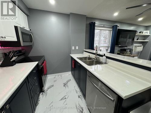 #110 -91 Aspen Springs Dr, Clarington, ON - Indoor Photo Showing Kitchen With Double Sink