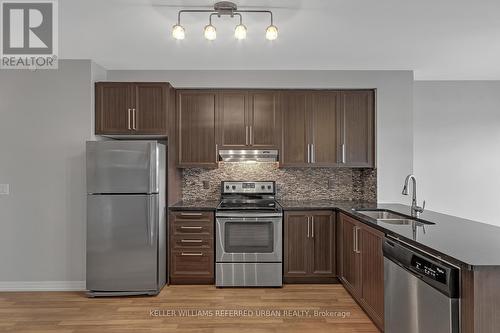 #203 -3563 Lake Shore Blvd W, Toronto, ON - Indoor Photo Showing Kitchen With Stainless Steel Kitchen With Double Sink With Upgraded Kitchen