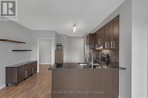 #203 -3563 Lake Shore Blvd W, Toronto, ON - Indoor Photo Showing Kitchen With Double Sink