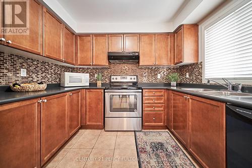 49 Unsworth Cres, Ajax, ON - Indoor Photo Showing Kitchen With Double Sink