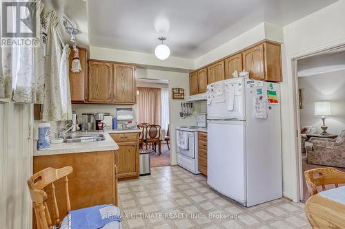 19 Manorglen Cres, Toronto, ON - Indoor Photo Showing Kitchen With Double Sink