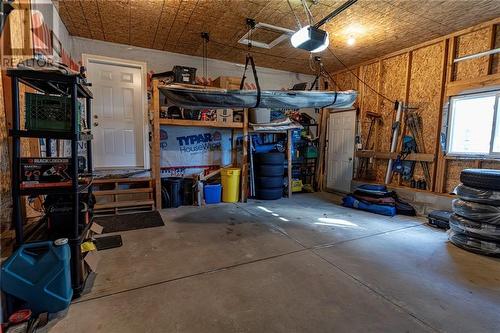 Large double garage plus a shed out back - 2044 Sandstone Crescent, Petawawa, ON - Indoor Photo Showing Garage