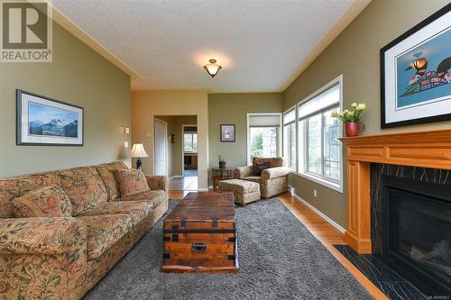 11 1288 Tunner Dr, Courtenay, BC - Indoor Photo Showing Living Room With Fireplace