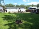 5303 Tamarack Crescent, Fort Nelson, BC  - Outdoor With Backyard 