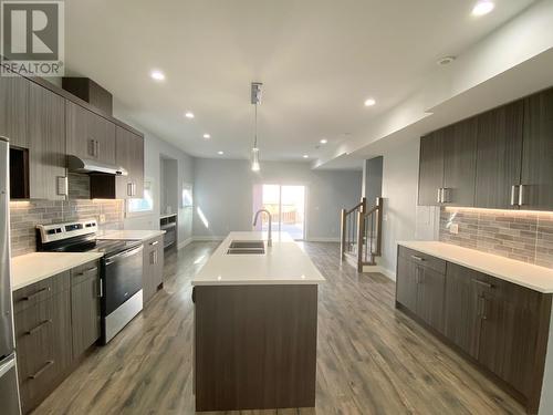 1056 Martin Avenue Unit# 3, Kelowna, BC - Indoor Photo Showing Kitchen With Stainless Steel Kitchen With Double Sink With Upgraded Kitchen
