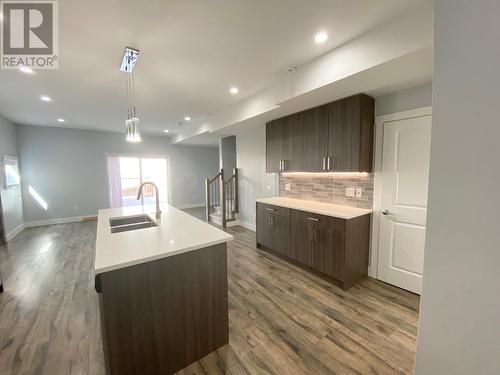 1056 Martin Avenue Unit# 3, Kelowna, BC - Indoor Photo Showing Kitchen With Double Sink