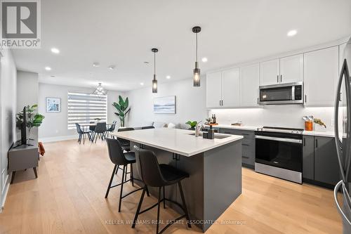 #301 -17 Cleave Ave, Prince Edward County, ON - Indoor Photo Showing Kitchen With Stainless Steel Kitchen With Upgraded Kitchen
