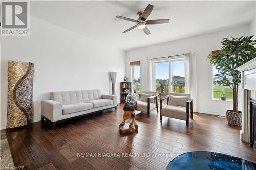 4432 Cinnamon Grve, Niagara Falls, ON - Indoor Photo Showing Living Room With Fireplace