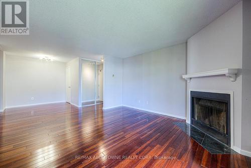 #124 -1496 Pilgrims Way, Oakville, ON - Indoor With Fireplace