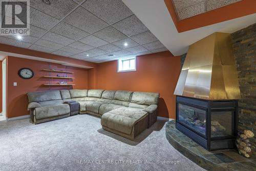 1633 Shore Rd, London, ON - Indoor Photo Showing Basement With Fireplace