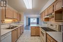 195 Warren Avenue Unit# 408, Penticton, BC  - Indoor Photo Showing Kitchen With Double Sink 