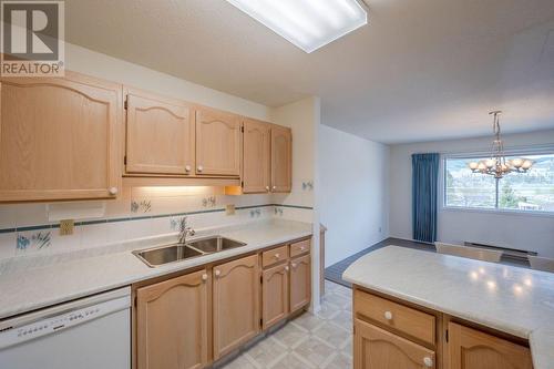 195 Warren Avenue Unit# 408, Penticton, BC - Indoor Photo Showing Kitchen With Double Sink