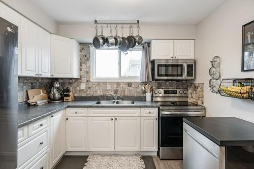 1355 Upper Gage Avenue|Unit #15, Hamilton, ON - Indoor Photo Showing Kitchen With Double Sink