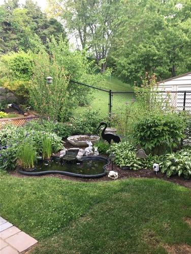 Goldfish pond with tranquil waterfall. (vendor supplied photo) - 64 Terrace Drive, Dundas, ON - Outdoor