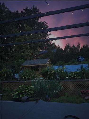The fairly lights at night over the hot tub watching the sun set.....(vendor supplied photo) - 64 Terrace Drive, Dundas, ON - Outdoor