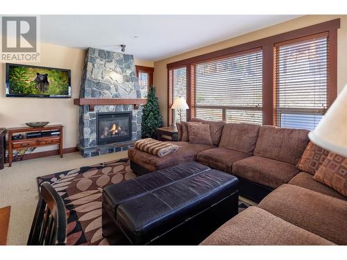 375 Raven Ridge Road Unit# 3 201, Big White, BC - Indoor Photo Showing Living Room With Fireplace