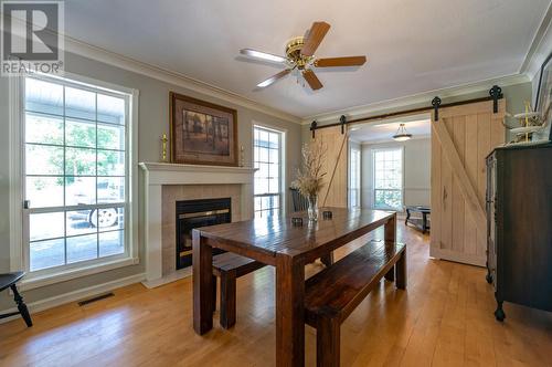 18740 Old Richter Pass Road, Osoyoos, BC - Indoor Photo Showing Dining Room With Fireplace