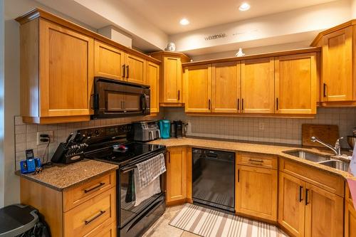 202-873 Forestbrook Drive, Penticton, BC - Indoor Photo Showing Kitchen With Double Sink