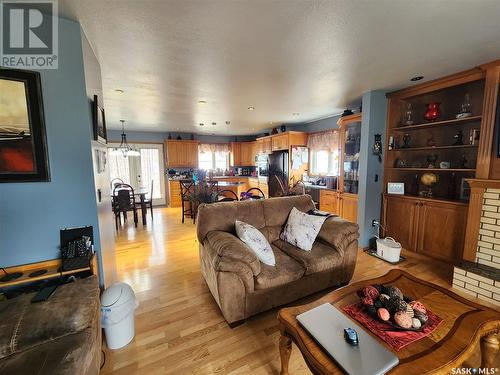 109 Taylor Street, Ogema, SK - Indoor Photo Showing Living Room With Fireplace